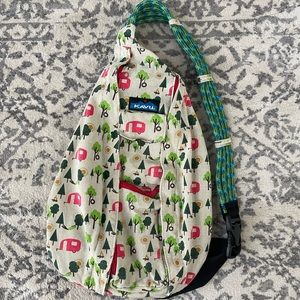 Kavu Sling bag. One Size. Campfire, trees, hammock, camper, sun pictures.